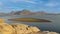View of pristine landscape of Jawai Dam with hills and clouds