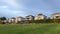 view of the private sector On a high hill, identical beautiful three-story houses mansions in the city of Surrey