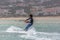 View of a professional sportsman practicing extreme sports Kiteboarding at the Obidos lagoon