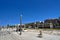 View of the promenade in Cagliari Marina. In the background elegant and historical buildings of Via Roma, Sardinia, Italy