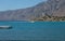 View from the promenade to the hills and the lighthouse. Natural background. Symi island, Mirarador, Greece