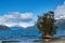 A view of the Puelo lake in Chubut, patagonia Argentina, on spring day. Beautiful landscape with snowy mountains and clouds on the