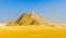 View of pyramids from the Giza Plateau: three Queens\' Pyramids,