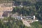 View of a quarry for stone mining in the European mountains. Industrial landscape mining