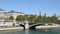 View of the quays of the Seine in Paris, France, during the summer.