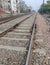 View of Railway Tracks from the middle during day time in Delhi India, Indian Railways track view, Indian Railway junction. Heavy