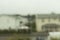 View of raindrops running on window glass. 