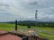 A view of the rainforest, lighthouse and viewing tower from a cruise ship in the Panama Canal