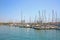 View from Rambla De Mar of the marina & many yachts moored at Port Vell, Barcelona, Catalonia, Spain.