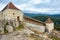 View of the ramparts and towers of the medieval fortress of Rasnov, Romania. City landscape, ancient town