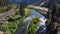 View of Rapids on Truckee river with train tracks and highway