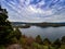 View of Raystown Lake in Pennsylvania in the Fall from Hawnâ€™s Overlook.  The water is smooth as glass, colorful trees in the