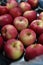 View of red apples placed on a packing tray