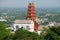 View of the red pagoda red chedi on top of the hill of Phra Nakhon Khiri. Phetchaburi, Thailand