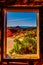 View of the red sandstone rock formations from one of the windows in the historic sandstone cabins in the Valley of Fire in NV USA