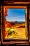 View of the red sandstone rock formations from one of the windows in the historic sandstone cabins in the Valley of Fire in NV USA