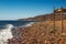 View of the Red Sea shore, pebble beach and kami close-up. Leisure concentration. Egypt, Dahab