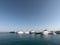 View of the Red Sea and white yachts. Egypt Hurghada. Boats, ships anchored off the coast. Port, pier. Summer and relaxation near