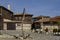 View of residential district with antique houses and old anchor in ancient city Nessebar or Mesembria on the Black Sea coast