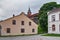 View of restored fortres buildings and fortifications built of large granite stones on a summer day