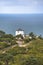 View of restored old mill turned into holiday home by the sea