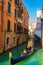 View of Rio de l\\\'Alboro canal with tourists enjoy gondola ride Italy