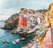 view of Riomaggiore fishing town in Cinque terre nature park. Travel and vacation destination in Italy and Europe