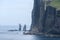 View of Risin og Kellingin sea stacks from village of Tjornuvik, Faroe Islands