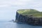 View of Risin og Kellingin sea stacks from village of Tjornuvik, Faroe Islands