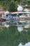 View of the river and boats and the activities of residents near the Siti Nurbaya Padang bridge, West Sumatra, Indonesia,