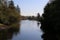 A view of a river bordered by trees