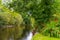 View of the river Cong from the bank of the river in the village