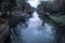 View of river Crane in Cranford park on a gloomy day