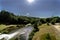 View of a river of Galicia Spain and drainage of a reservoir seen from the top of the dam