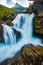 View of the river Geirangerelvi and the waterfall Storfossen in Geiranger, Norway