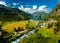 View of the river Geirangerelvi and the waterfall Storfossen in Geiranger, Norway