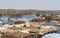 View of river nile in Aswan Egypt with Nubian village houses in foreground