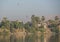 View of river nile in Egypt showing Luxor west bank with hot air balloon