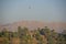 View of river nile in Egypt showing Luxor west bank with hot air balloon