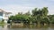 View on River Side from Thai Wooden Cruise Boat on Water Canal. Bangkok, Thailand - 02 DEC 2017.