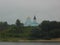 View from the river to the church. Christian orthodox temple. Russia.