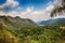 The view of river and Waterfall El- Nicho and trees and mountains in Cuba