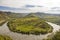 View of a riverbend of the Moselle River in the Eifel village of Bremm in Germany in summer