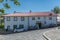 View at the road on Braganca city downtown, with a promenade snack bar on classic buildings