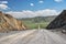 View on road, mountains and sky with clouds from the Obotyn-Dab