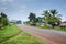 View of a road passing through a small town with houseâ€™s and vehicles, Rweteera, Fort Portal, Uganda