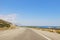 View of the road on a sea shore in Greece