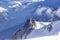View of the rock of Aiguille du Midi from top Mont-Blanc mountain, France, by beautiful weather