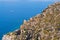 View on rock coastline and ocean from hiking trail on Greek island Telendos.