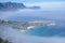 view from The Rock viewpoint in Cape Town over Campsbay, view over Camps Bay with fog over the ocean